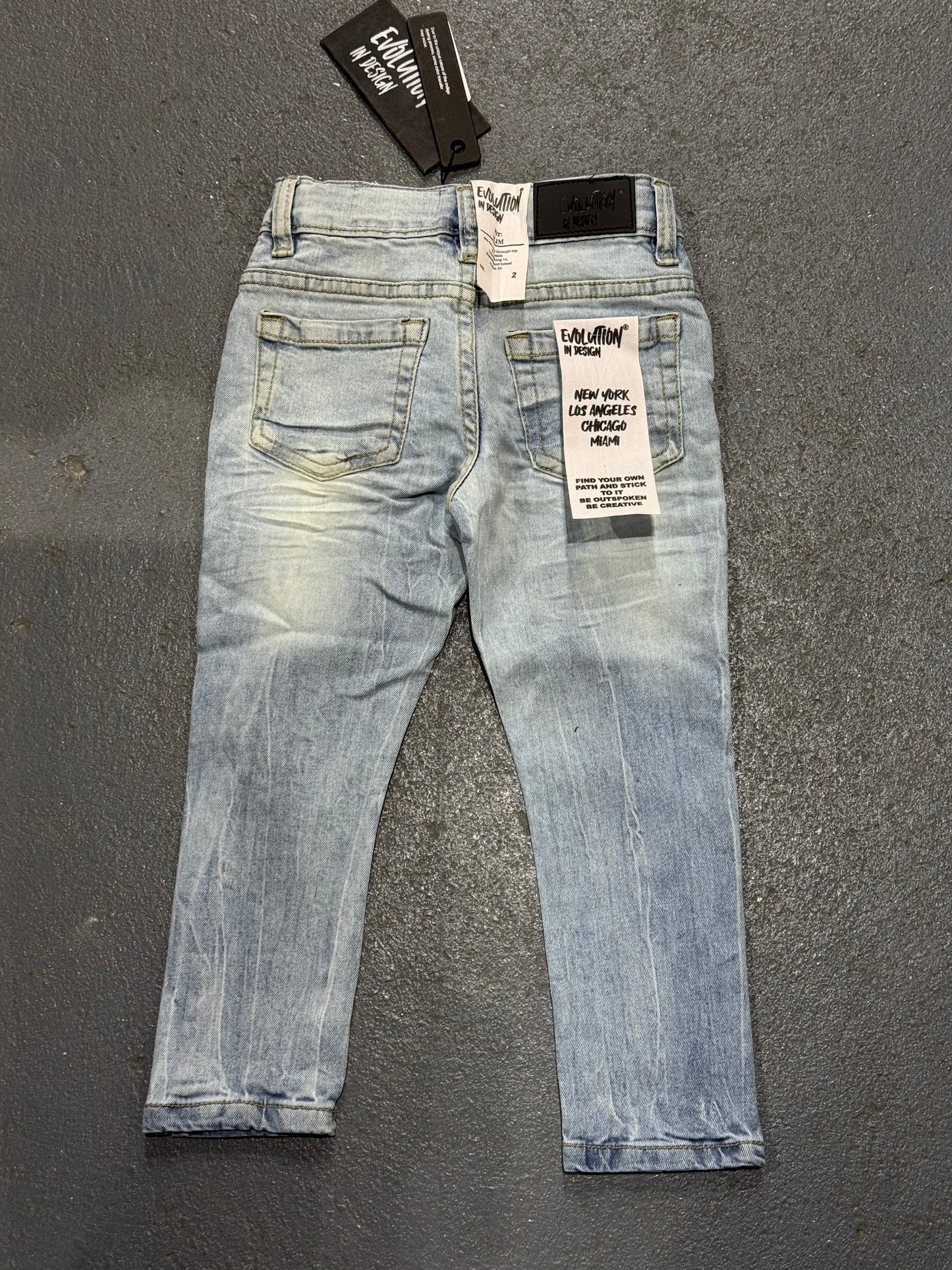 Evolution In Design Toddler Blue Light-Washed Jeans.